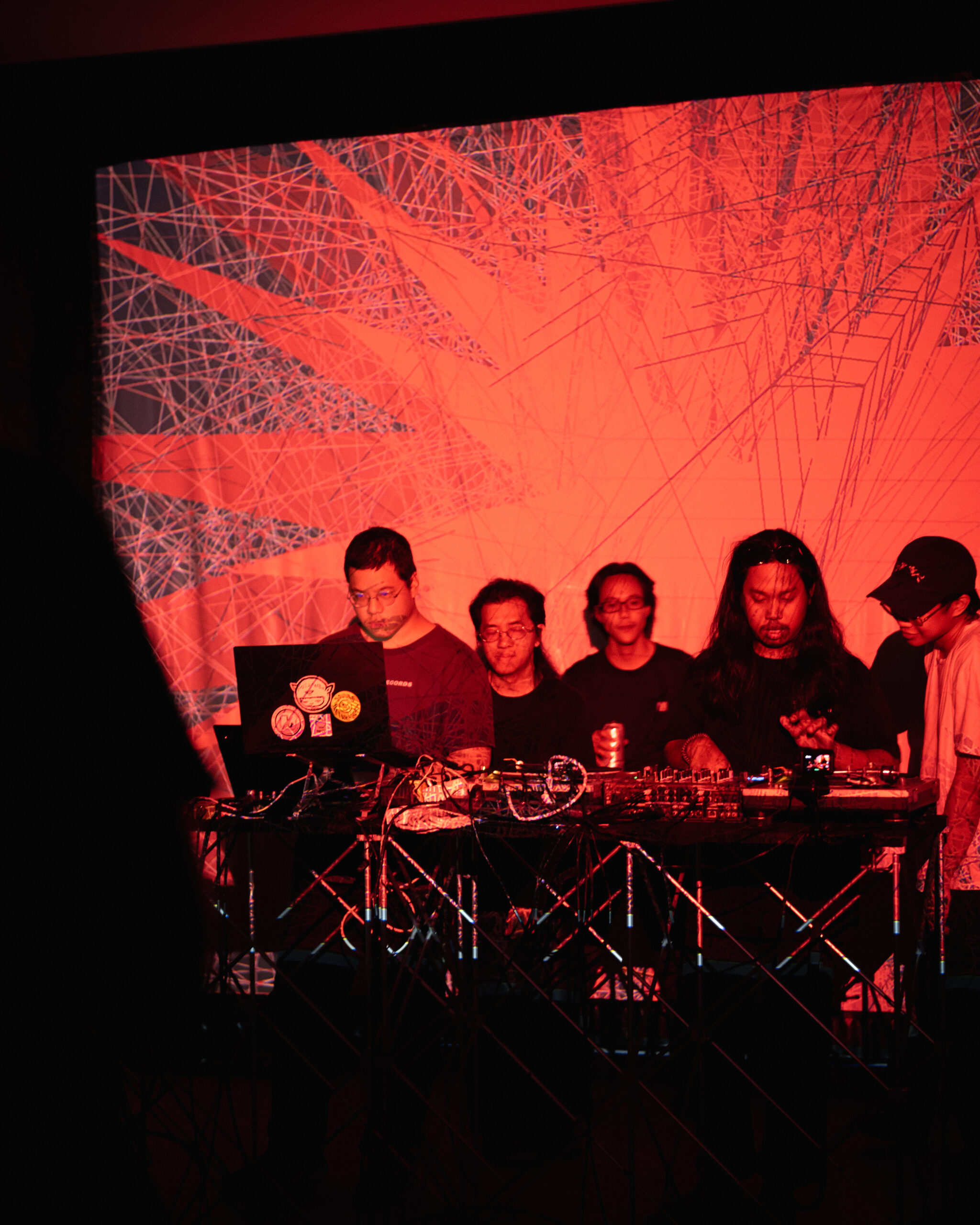 Art space Bangkok — raw concrete room with considered light at Begrüntes Haus, Phra Khanong